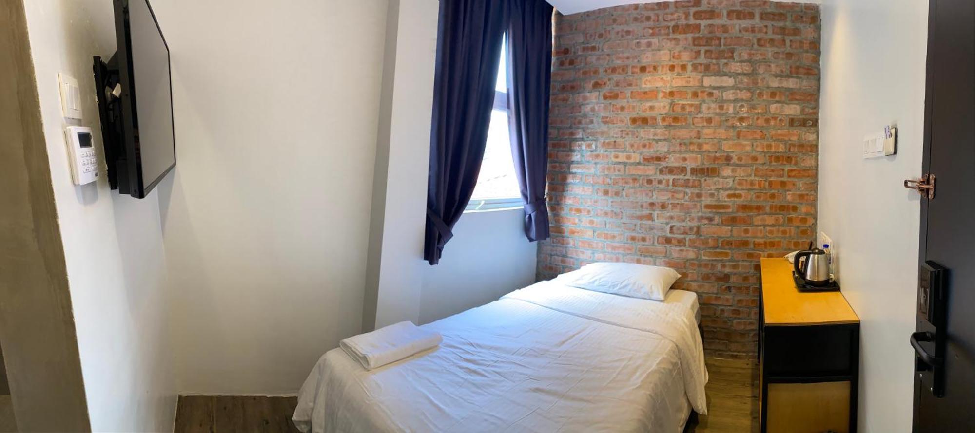 Super 8 Hotel Алор Сетар Екстериор снимка